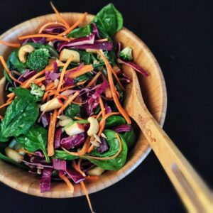 This Crunchy Cashew Salad with Honey Ginger Dressing is a great nutrient dense meal that elite runner Tina Muir enjoys to fuel her training.